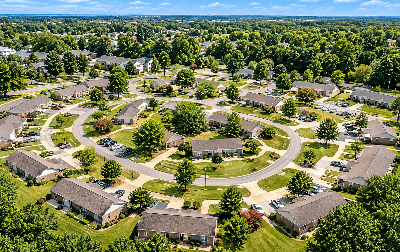 A bird's eye view of a residential neighborhood with houses and trees.